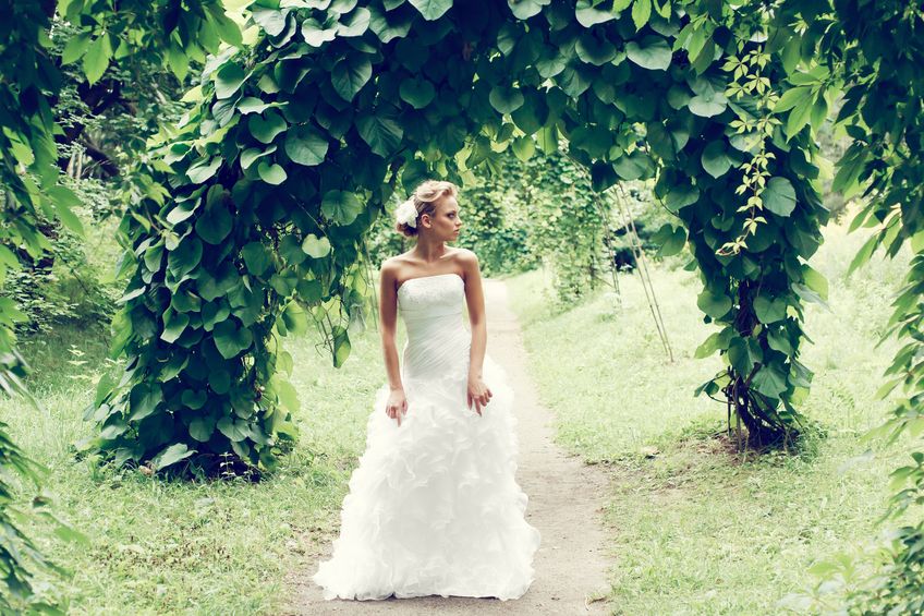 beautiful bride in a garden during vegan wedding
