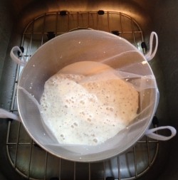 Straining almond milk