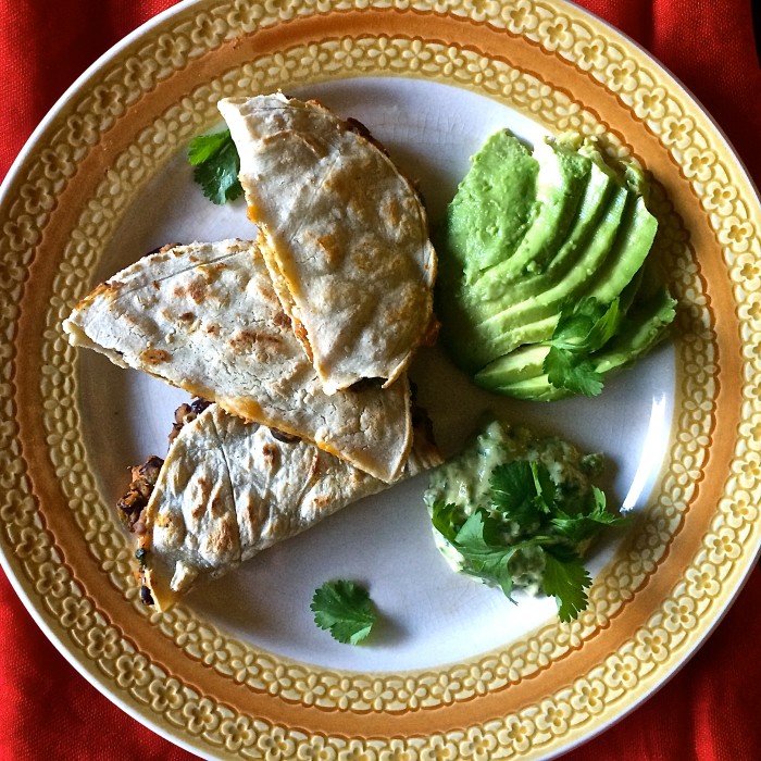 Vegan Cheesy Pumpkin Black Bean Quesadilla with Roasted Jalapeno Cream