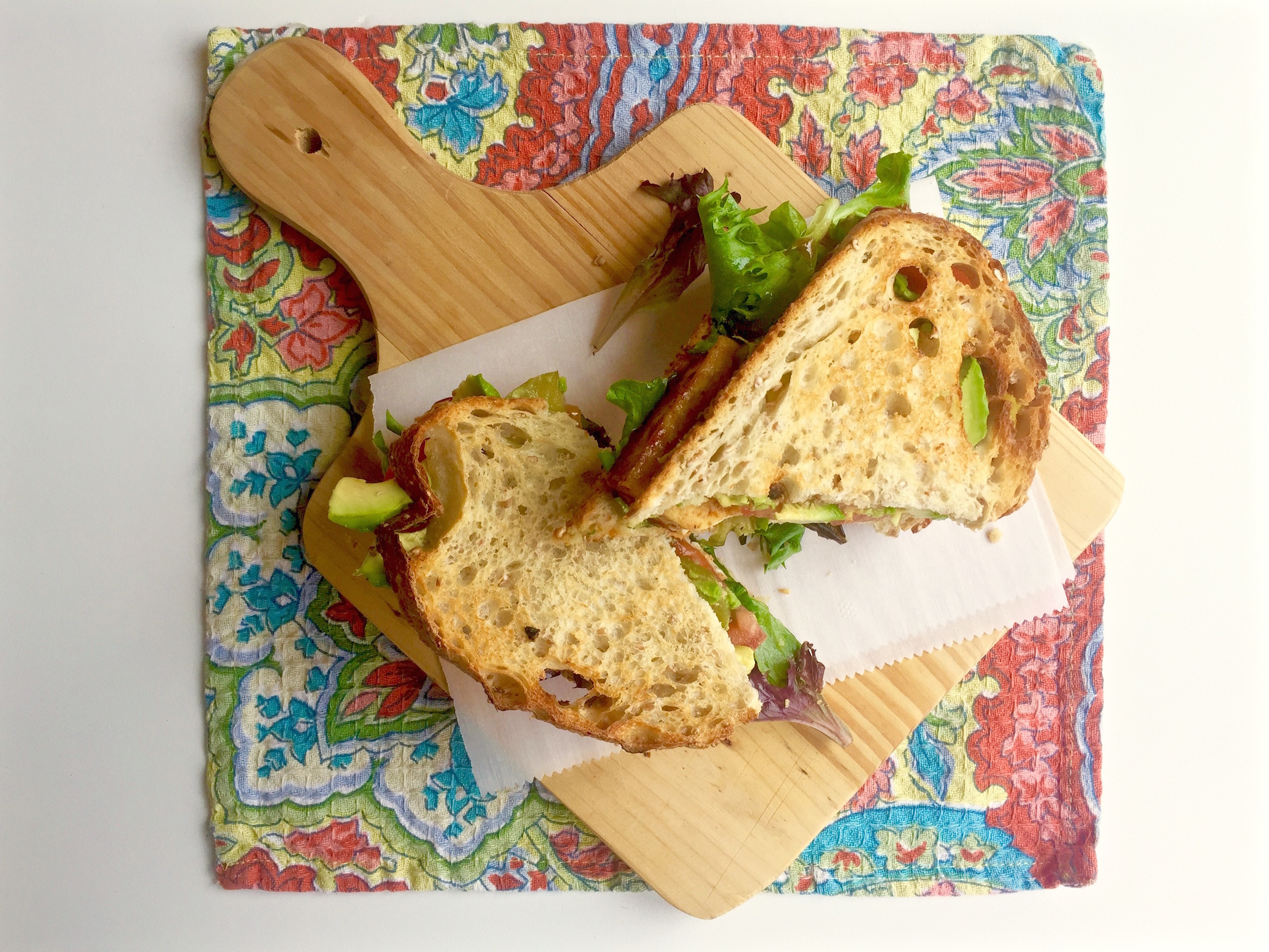 BBQ Tofu Sandwich on a cutting board.