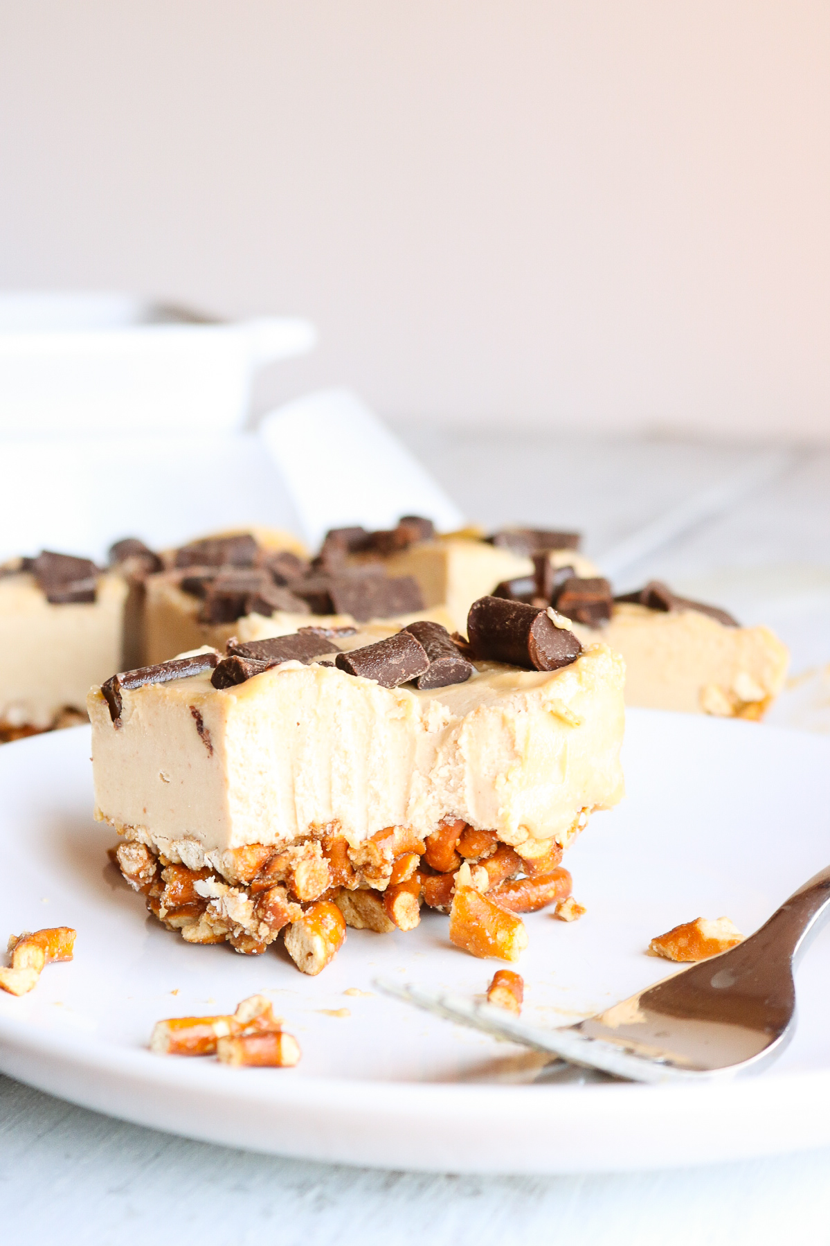 No Bake Vegan Peanut Butter Cheesecake with Pretzel Crust and Chocolate Chunks