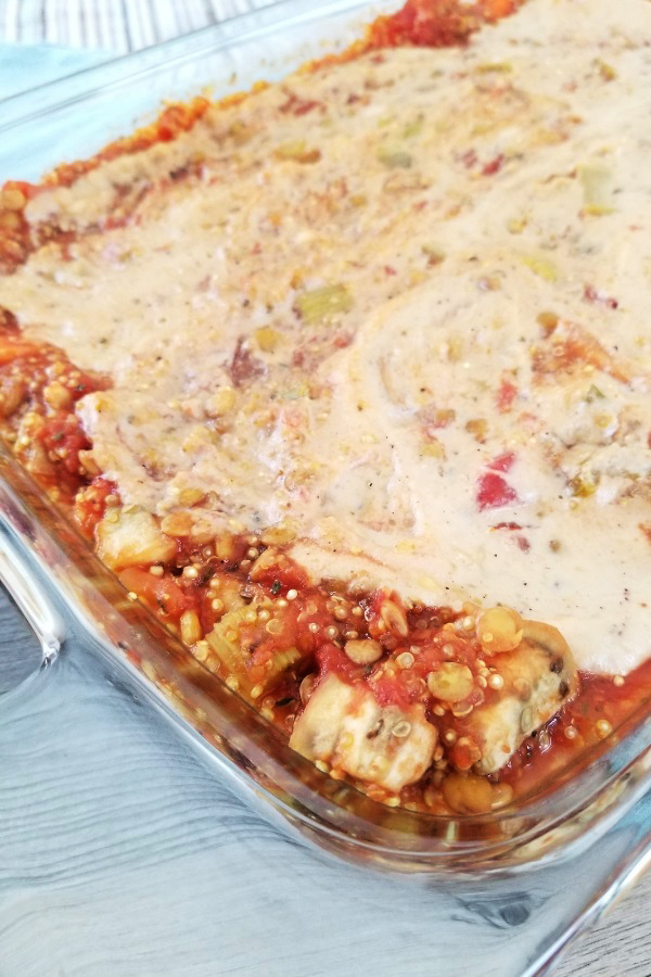GF vegan quinoa lasagna in a baking dish, shot from above