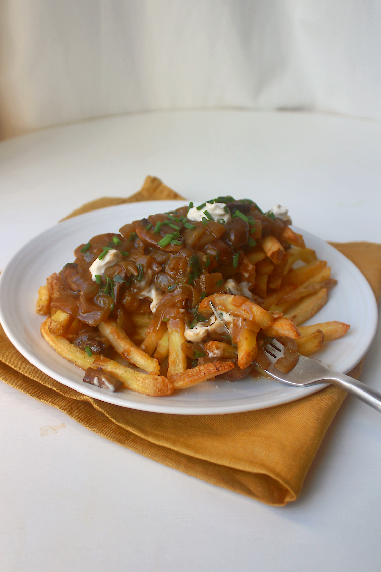 vegan poutine with garlic mushroom gravy