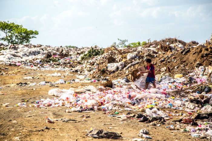 boy on trash island 