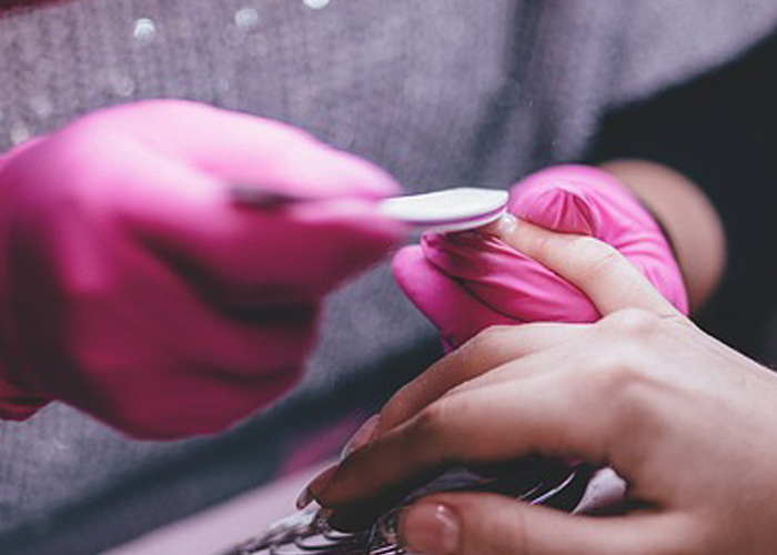 nail-technician-wearing-gloves