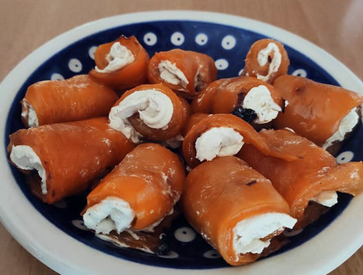 vegan bell pepper salmon and cream cheese rolls on a plate