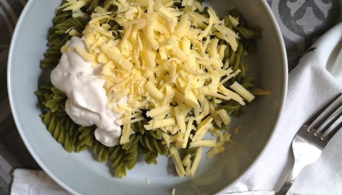 hungarian mac n cheese in a bowl next to a fork