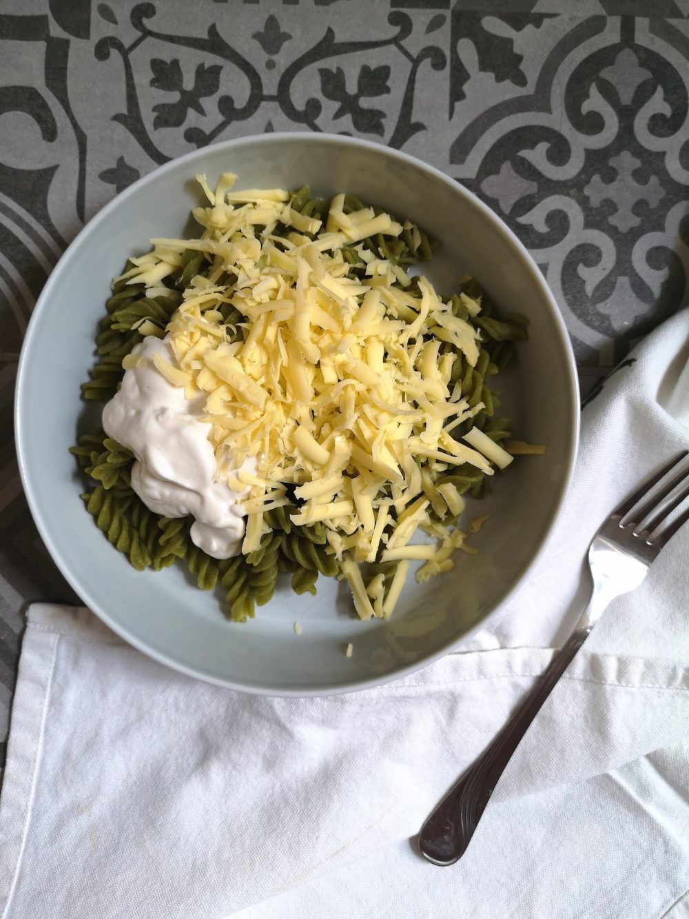 hungarian mac n cheese in a bowl next to a fork