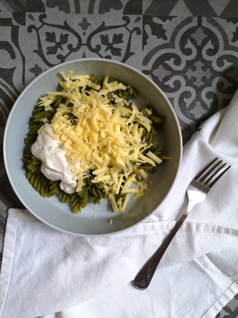 hungarian mac n cheese in a bowl next to a fork