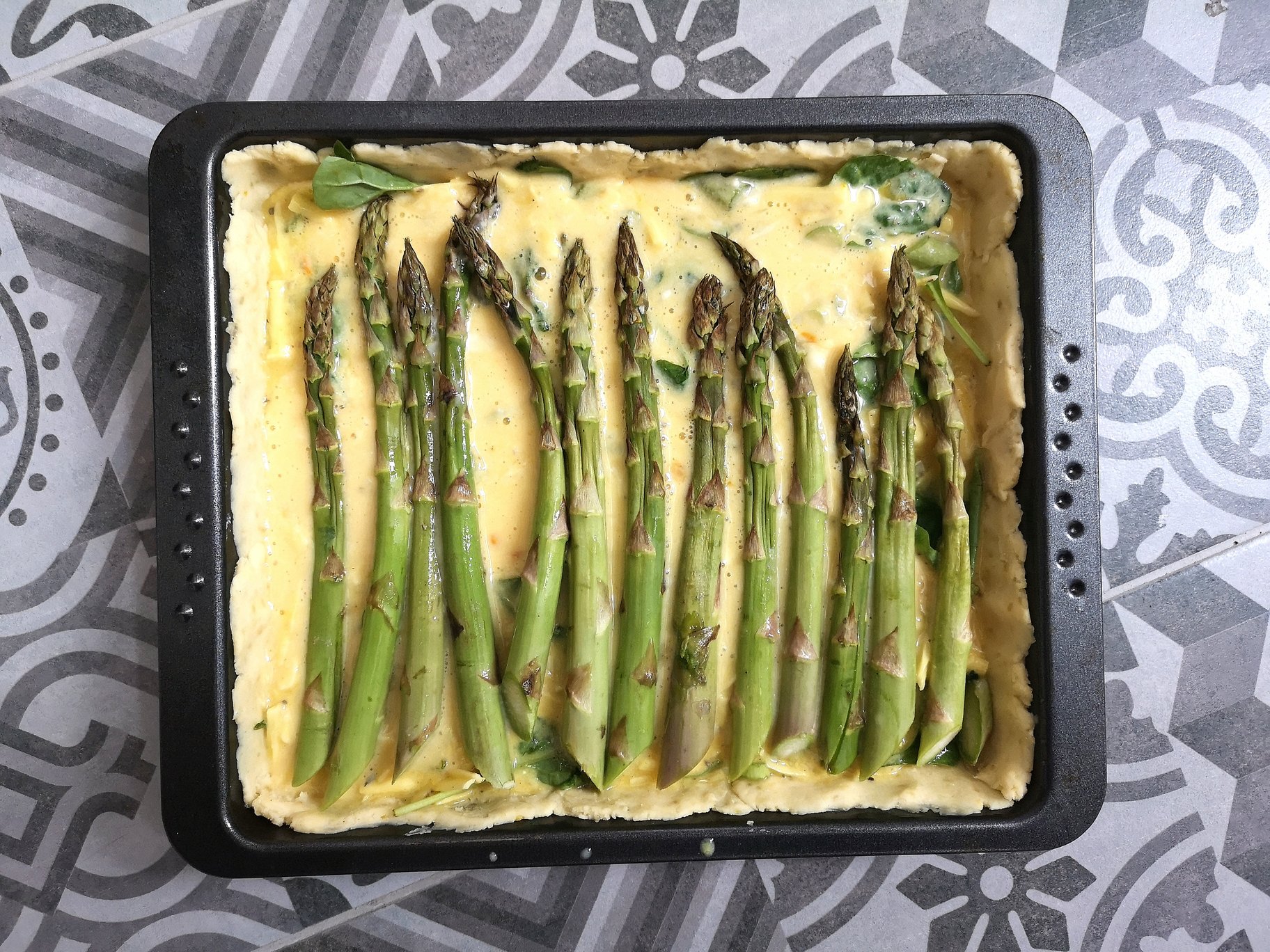 vegan spinach asparagus pie in a pan