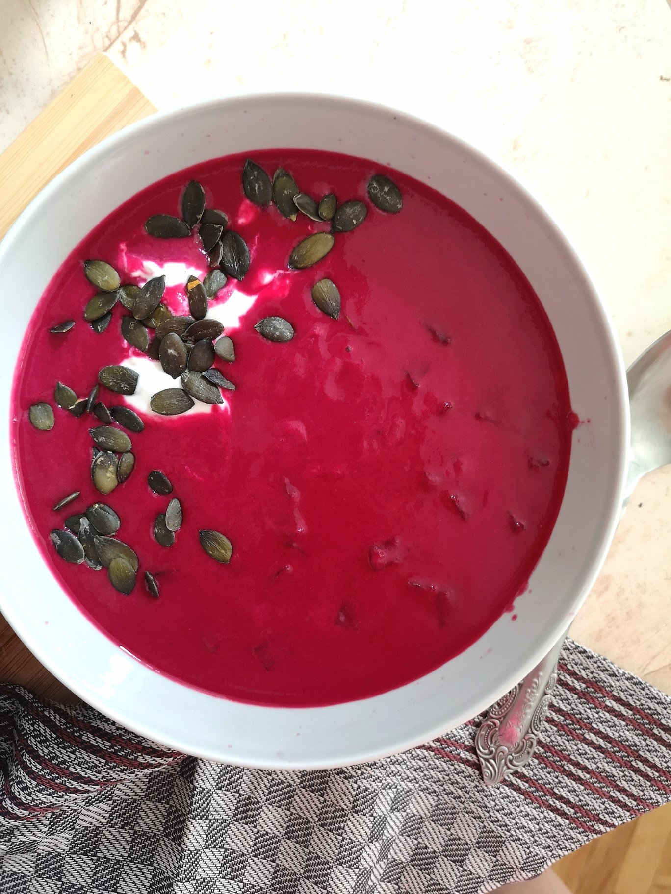 cold beet cream soup in a white bowl