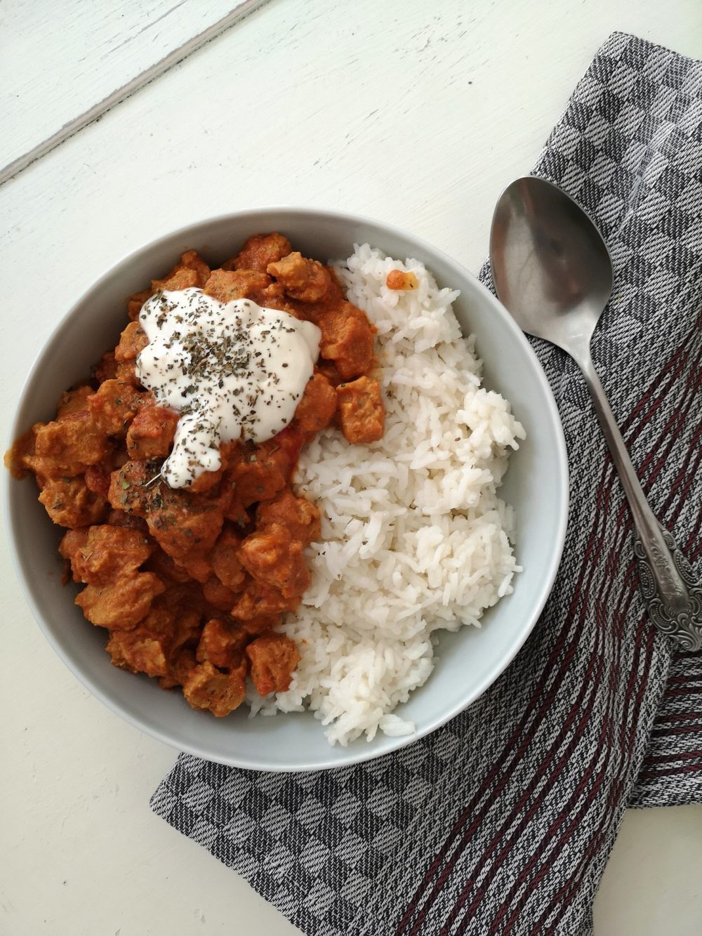garam masala curry in a white bowl
