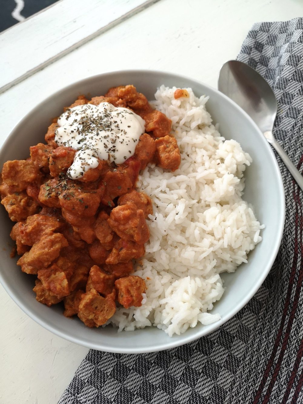 garam masala curry in a white bowl