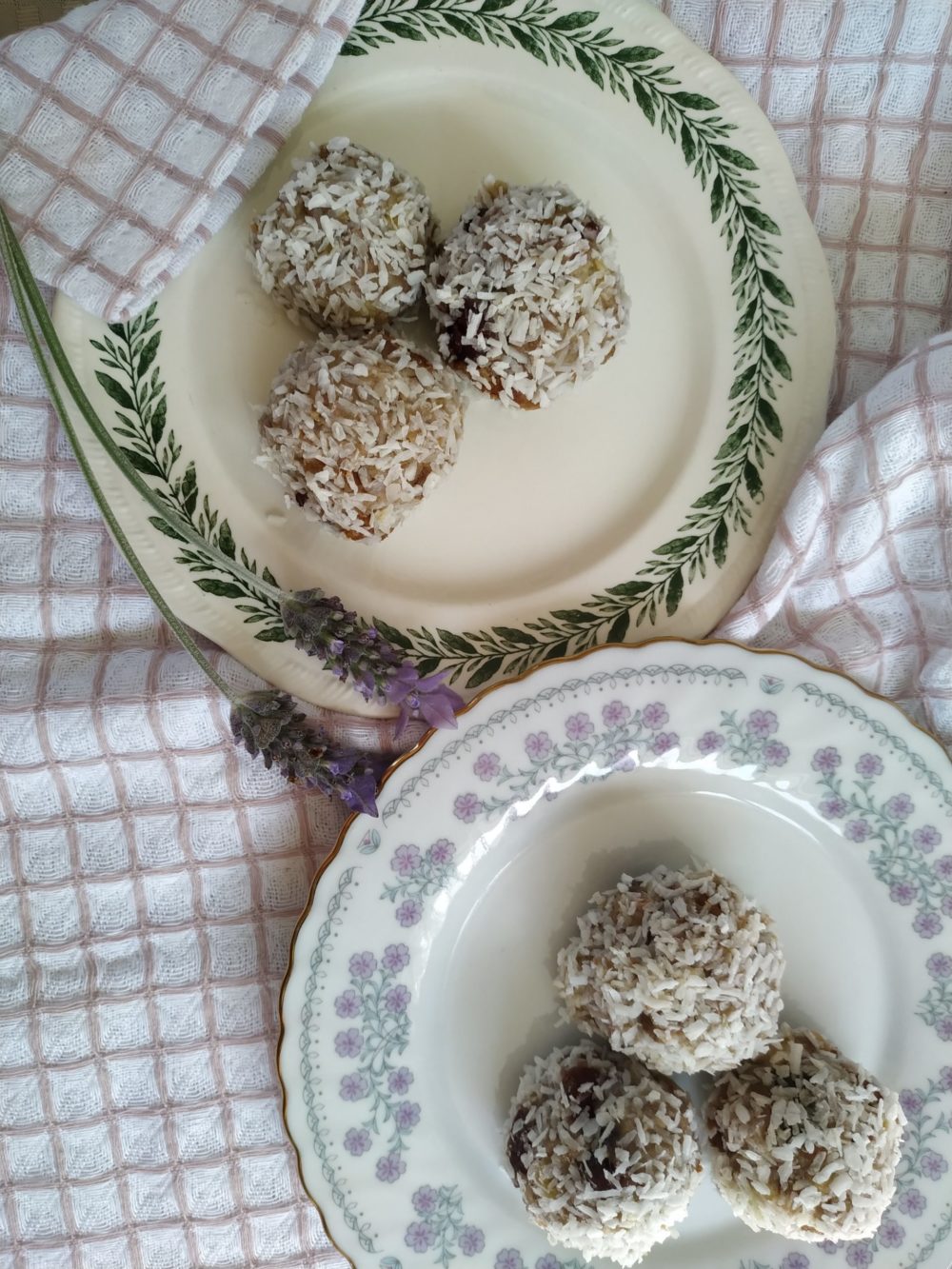 banana coconut energy balls on a floral plate