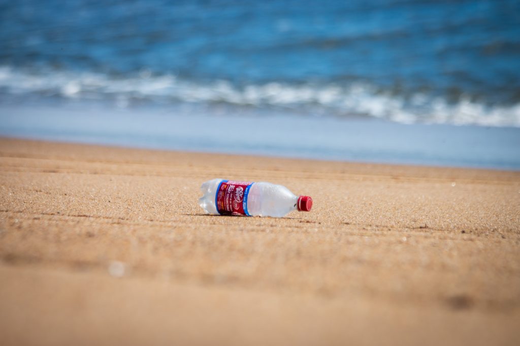 Plastic bottle laying on beach