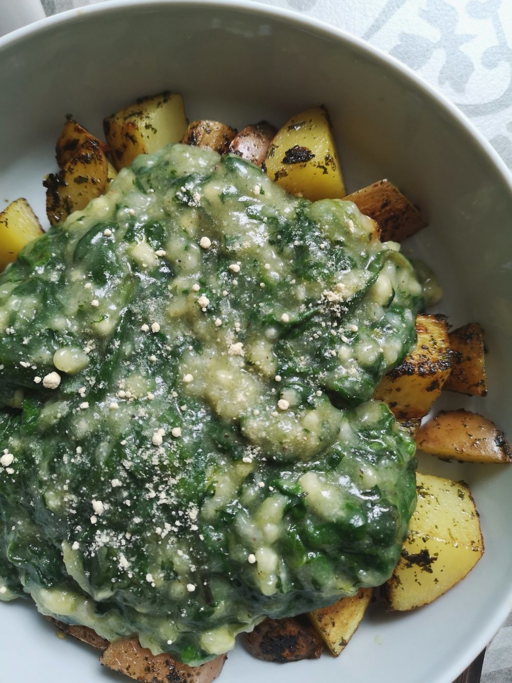 Vegan Creamed Spinach in a white bowl