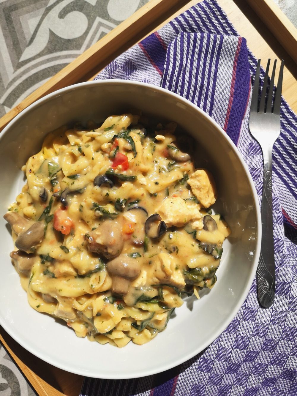 tofu mushroom florentine in a white bowl