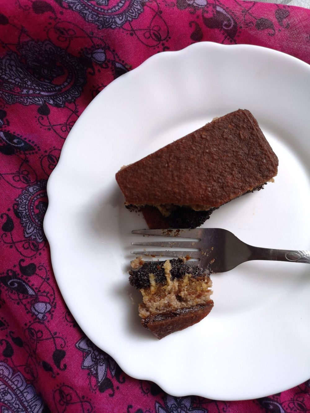 Jewish apple cake on a white plate