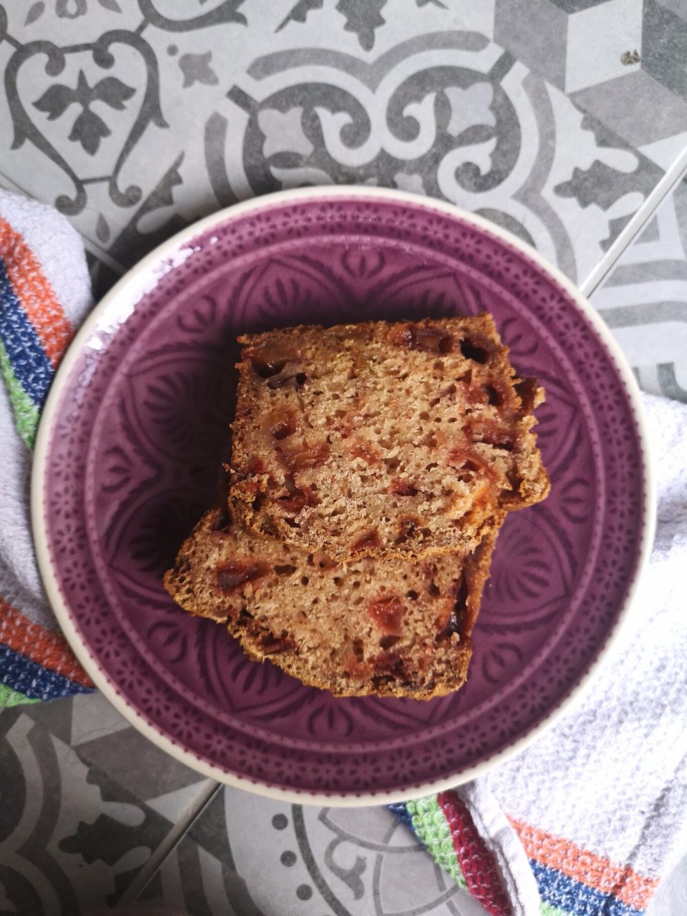 vegan cinnamon apple pear bread on a purple plate