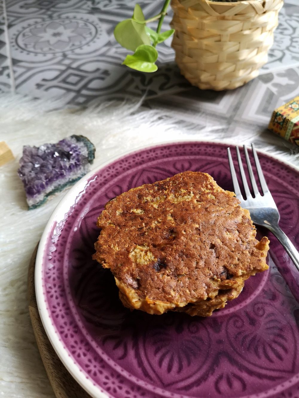 pumpkin banana protein pancakes on a purple plate