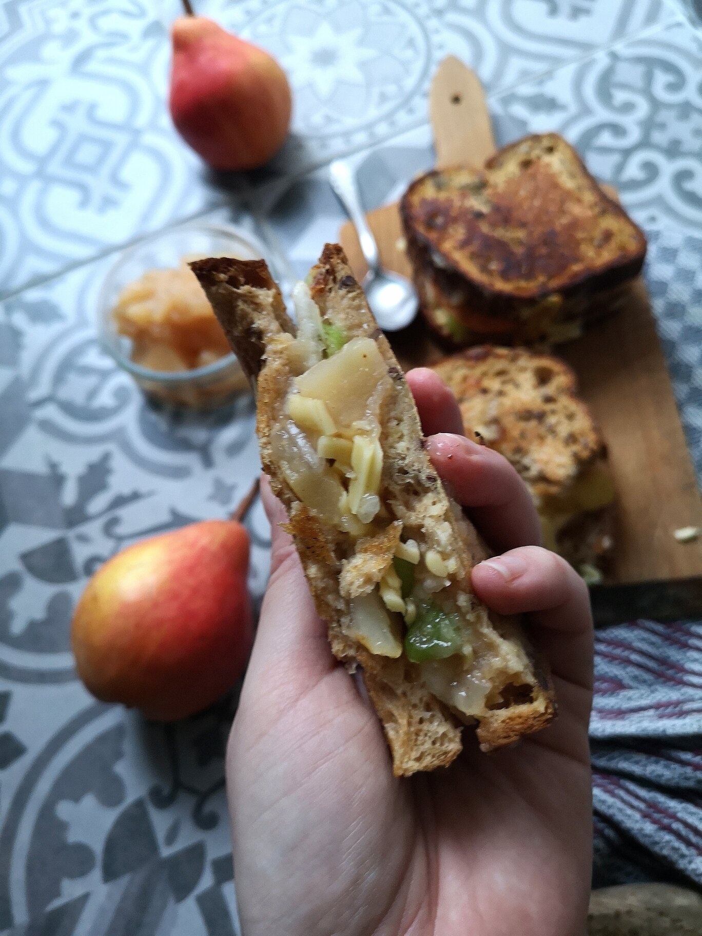 pear grilled cheese on a cutting board