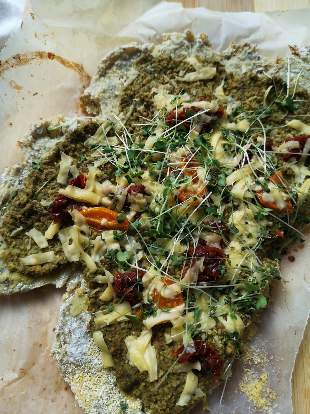 cauliflower pizza with microgreens