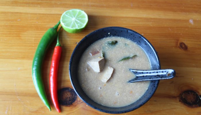 Vegan tom yum soup with chillies and tofu