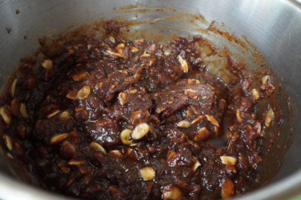 mixture for vegan date bars in a silver bowl