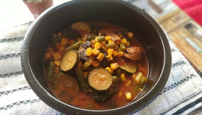 chinese five vegetable stew in a dark bowl