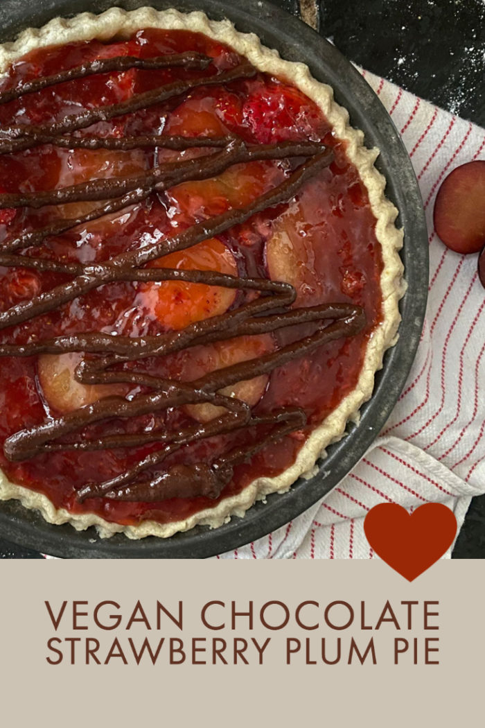 vegan chocolate strawberry plum pie with overlayed caption