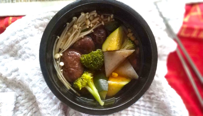 vegan oden in a black bowl