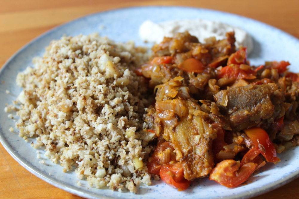Healthy Balti with cauliflower rice on a plate