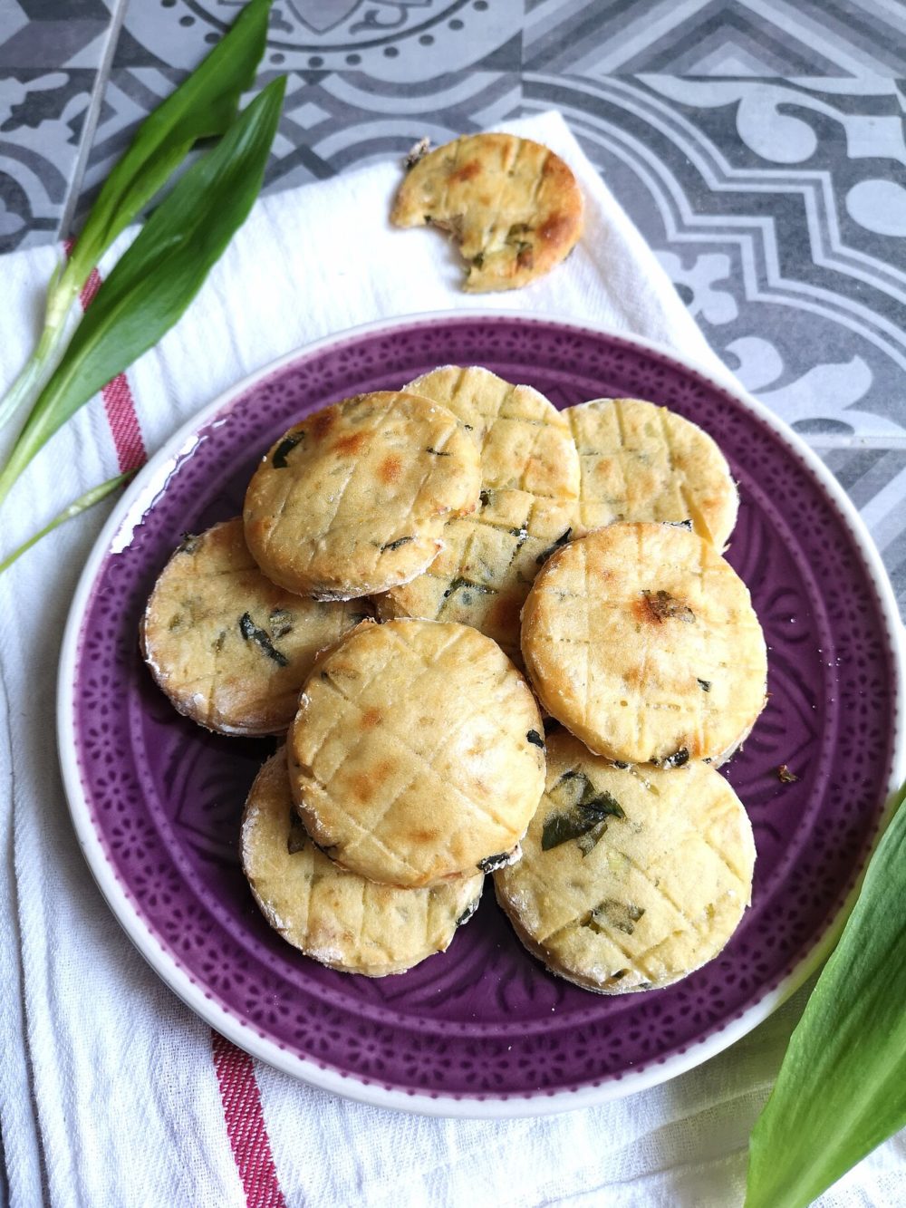 ramson scones on a purple plate on a table