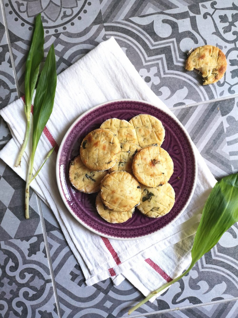 wild garlic scones on a purple plate on a table
