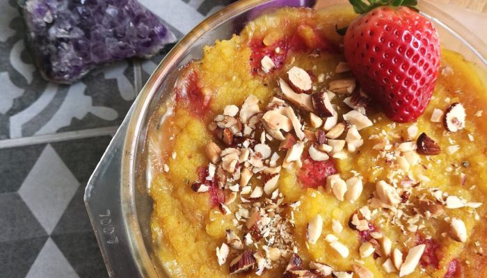 rice pudding in a clear dish on a table