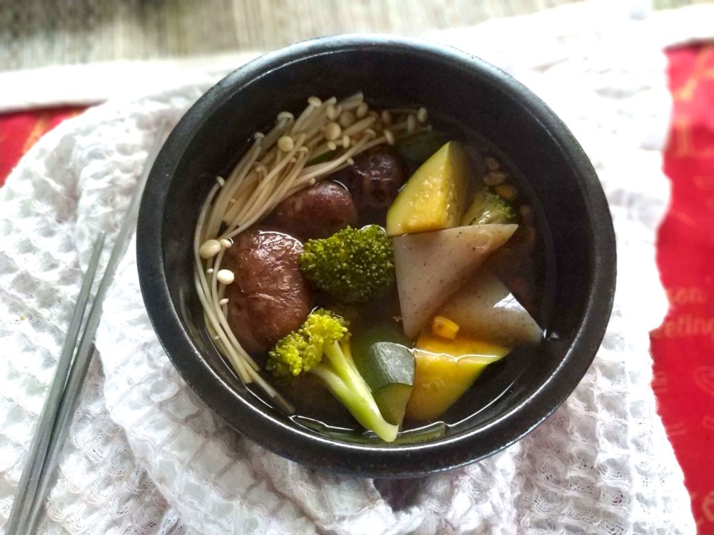 vegan oden in a black bowl