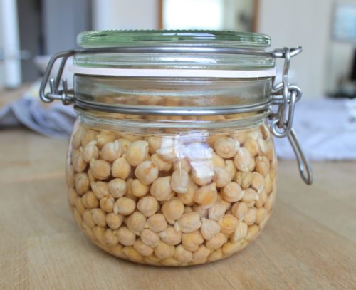 a clear jar of chickpeas