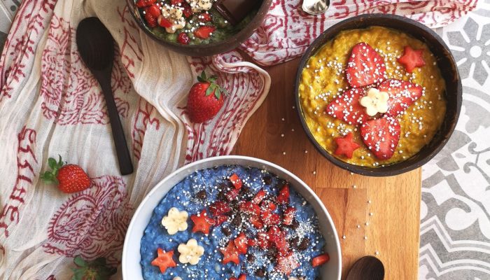 rainbow rice flakes on smoothie bowls on a table