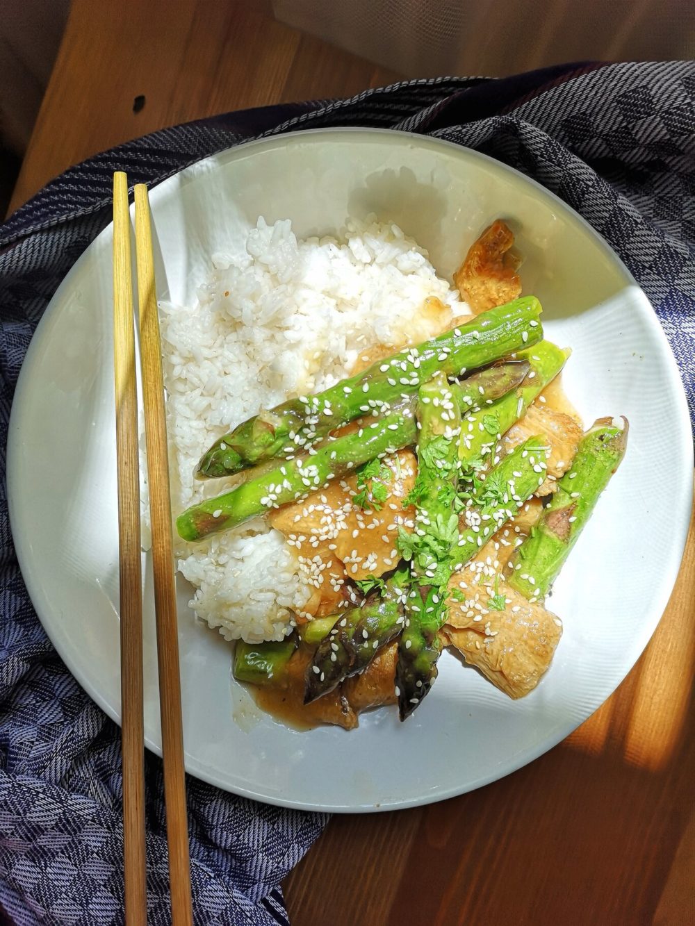 asparagus stir fry on a white plate