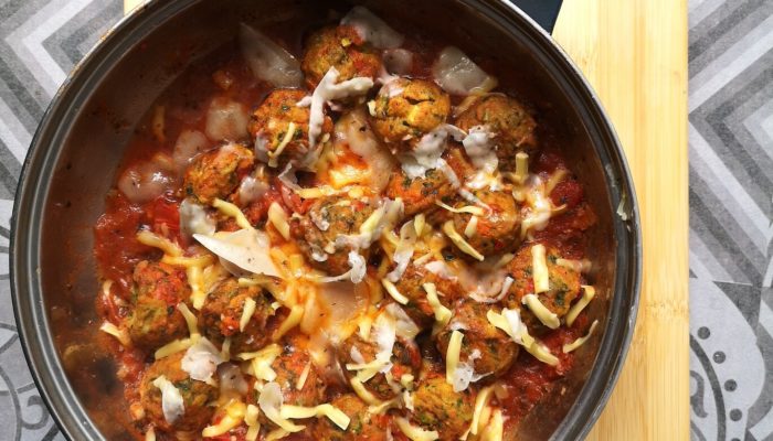 swedish veggie balls in a pot on a cutting board