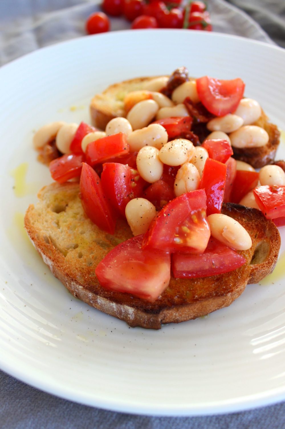 butterbean bruschetta on a white plate