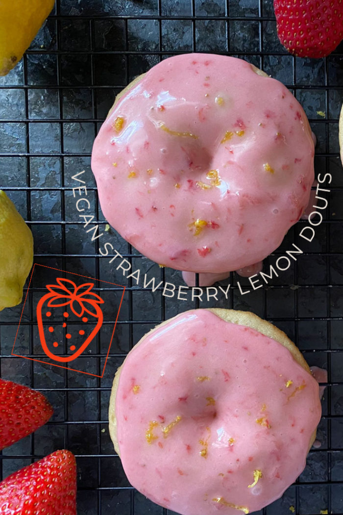 vegan strawberry lemon donuts on a black cooling rack with overlayed caption