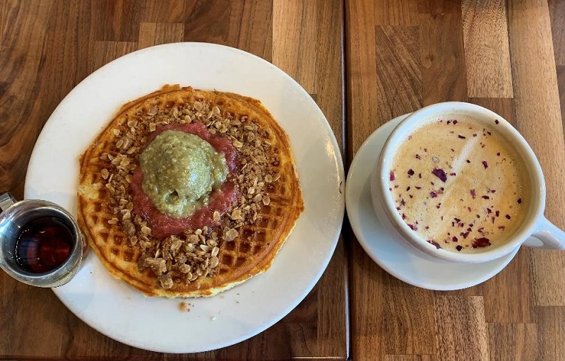 Vegan waffle and oat milk latte from Cafe Flora in Seattle, Washington.
