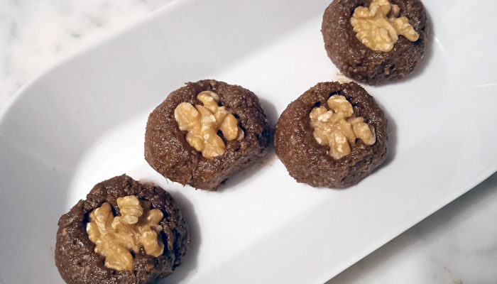 raw brownie bites on a white plate