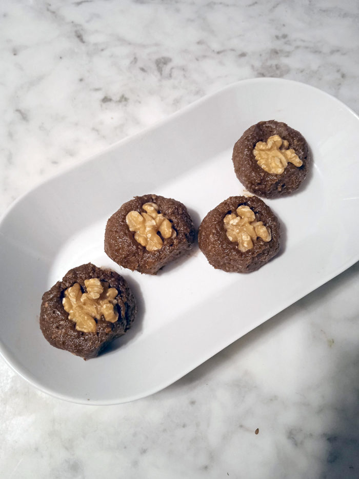 raw brownie bites on a white plate