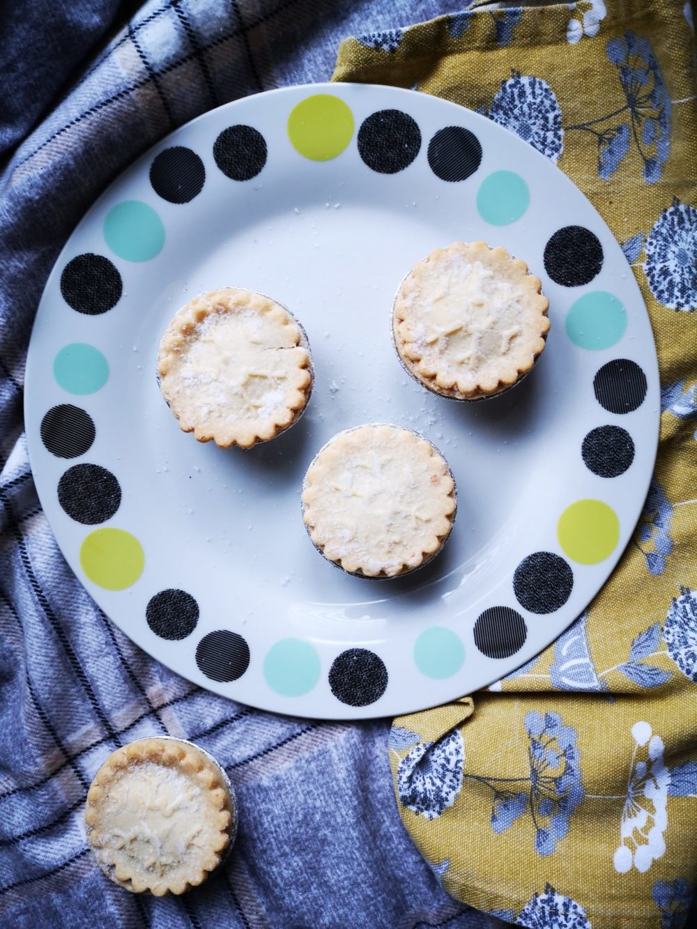 vegan mince pies on a decorative plate