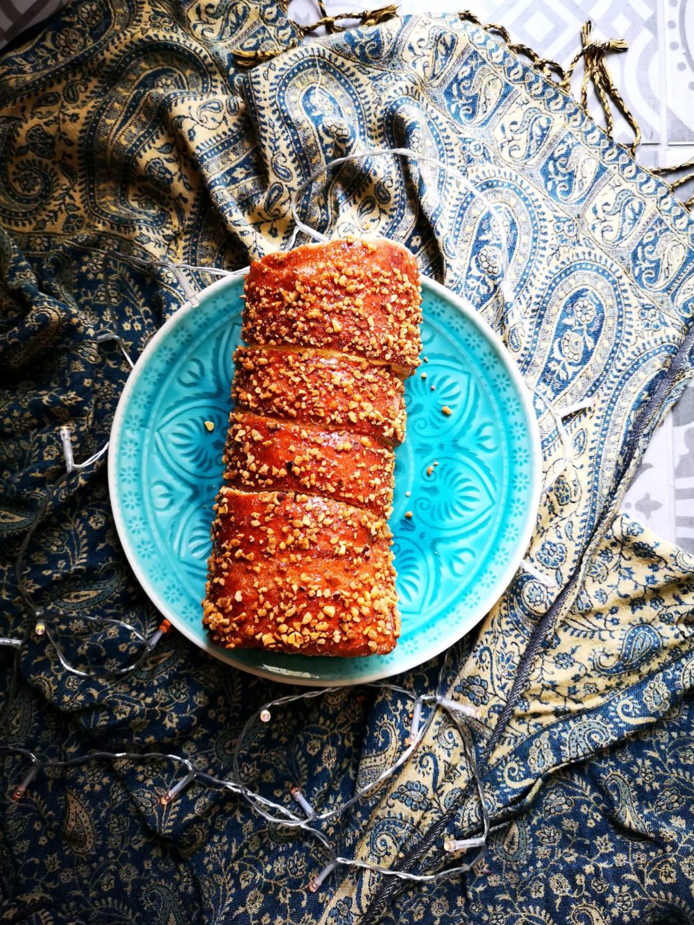 chimney cake on a blue plate