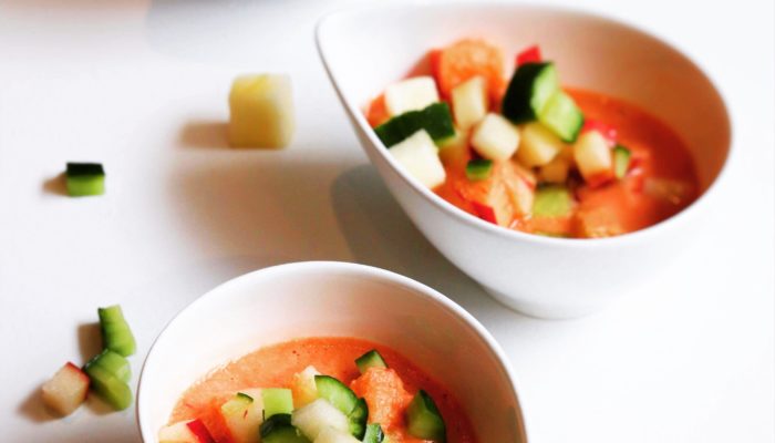 raw kimchi gazpacho in dishes with a white background