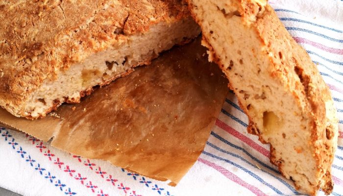 gluten free vegan cheddar bread with a knife
