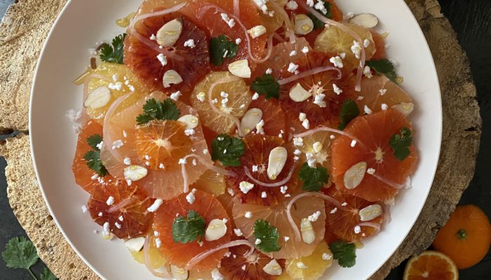 citrus salad on a white plate